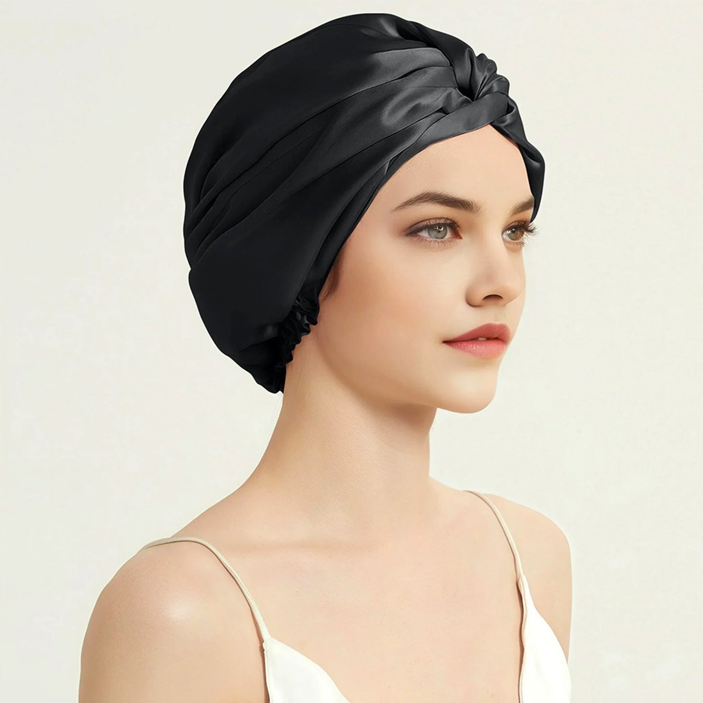 Black silk hair bonnet – worn by model, side profile