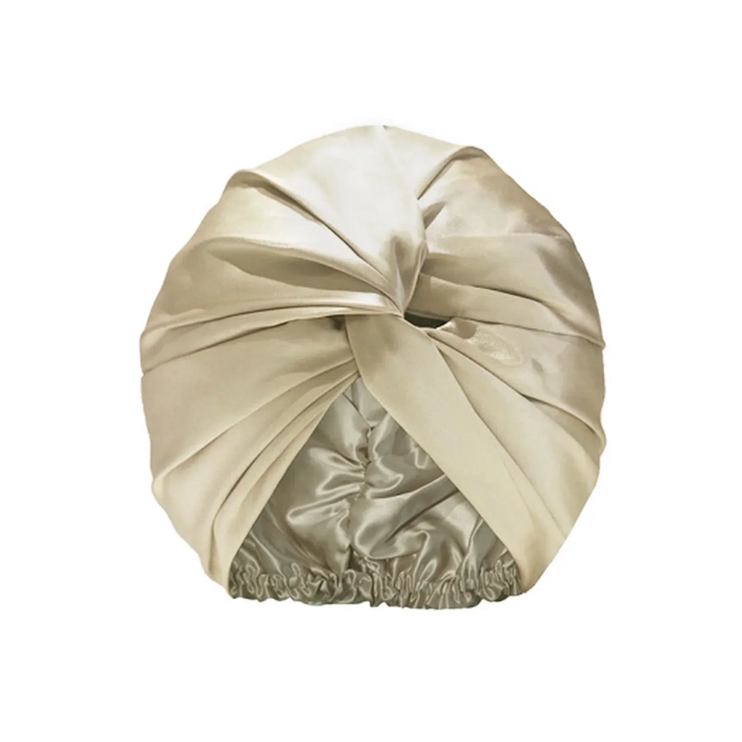 Champagne silk night bonnet – flat lay with soft lighting