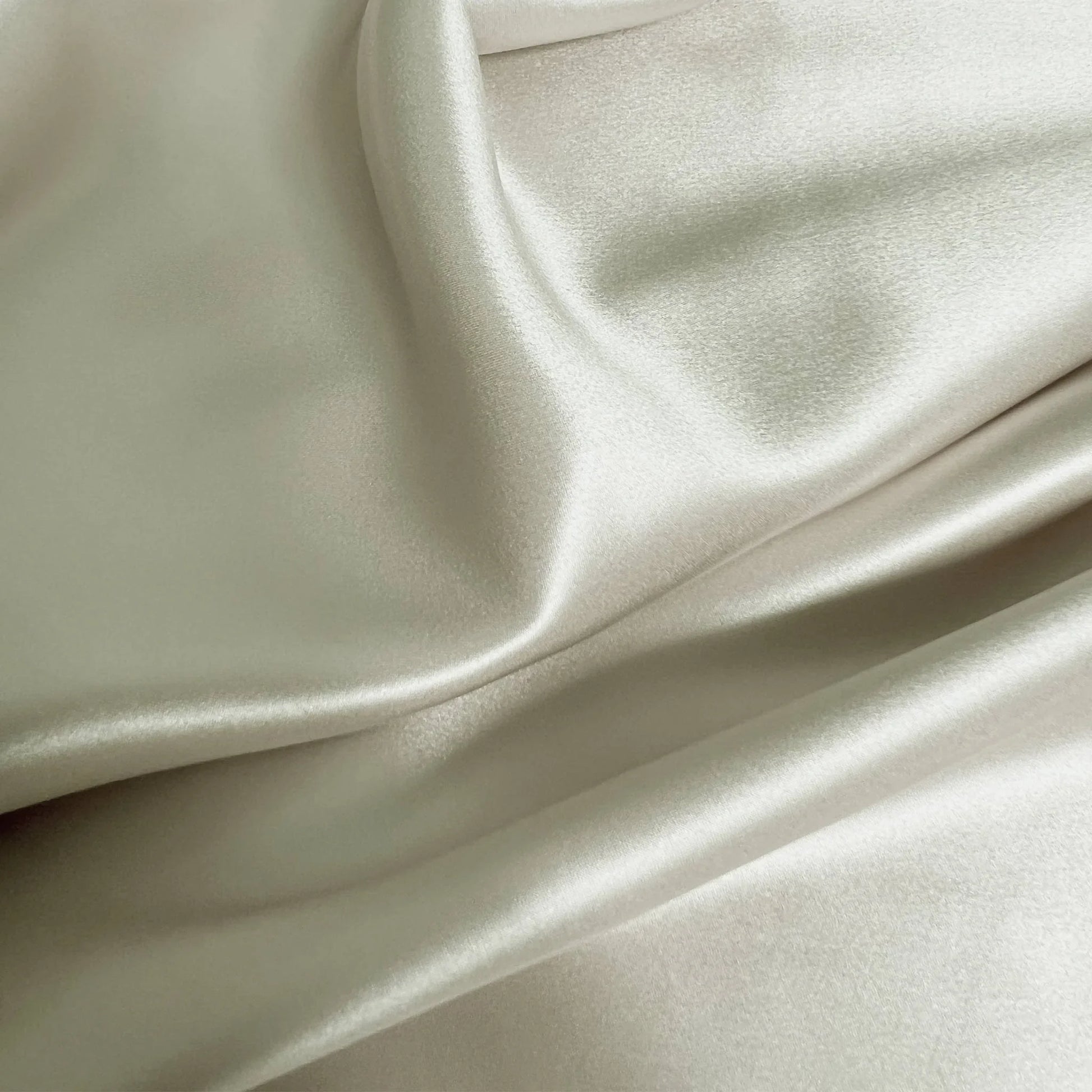 22 momme silk pillowcase – champagne, close-up fabric texture
