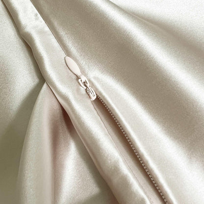 Close-up of a beige champagne fabric with a zipper