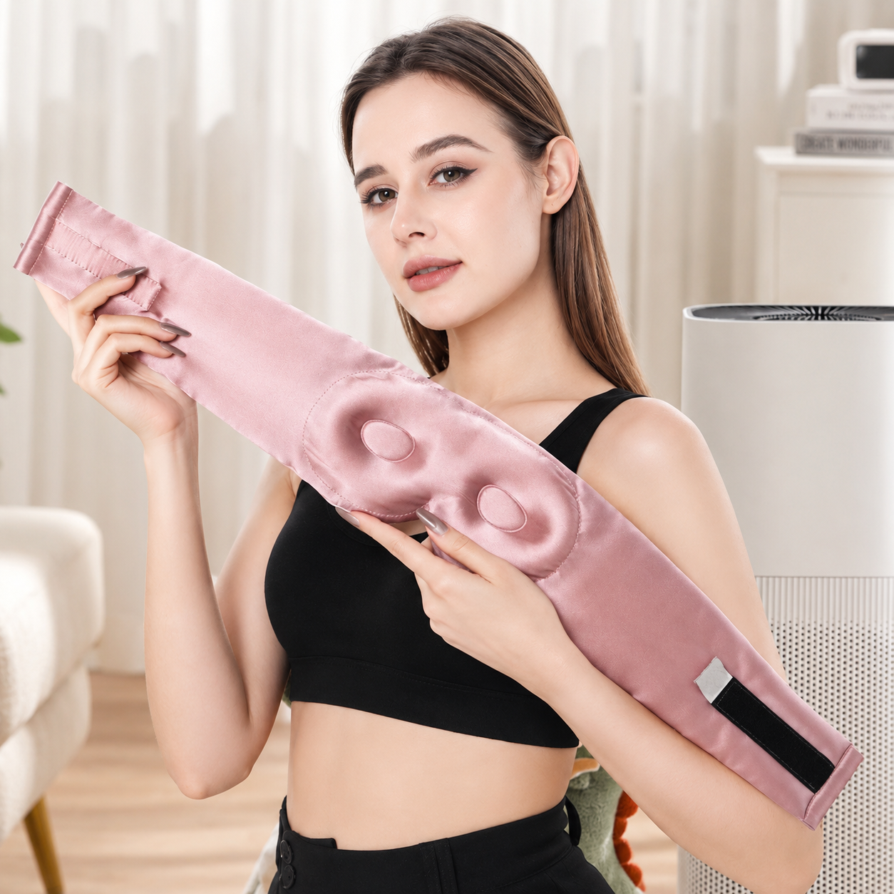 Woman holding the back of a 3D Mulberry Silk Eye Mask, showcasing the contoured eye cup design and adjustable strap for pressure-free comfort and complete blackout sleep.